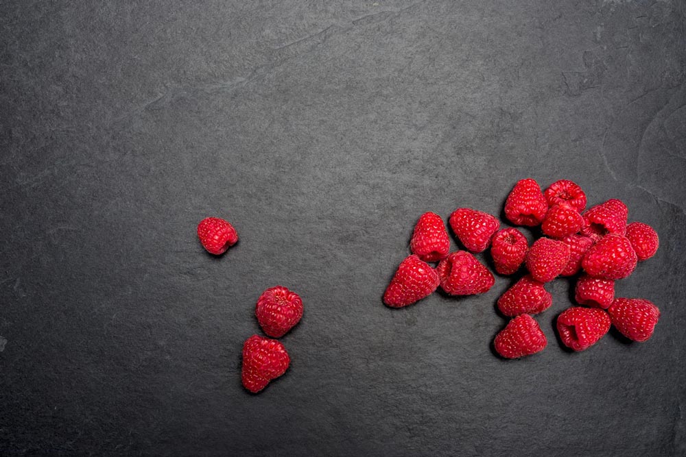Foodfotografie Pixelbäcker Werbeshooting Himbeeren Küchenplatte
